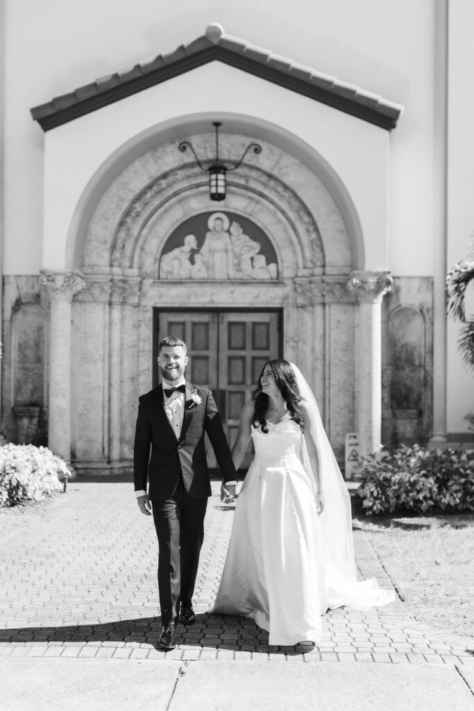 just married leaving church couple
