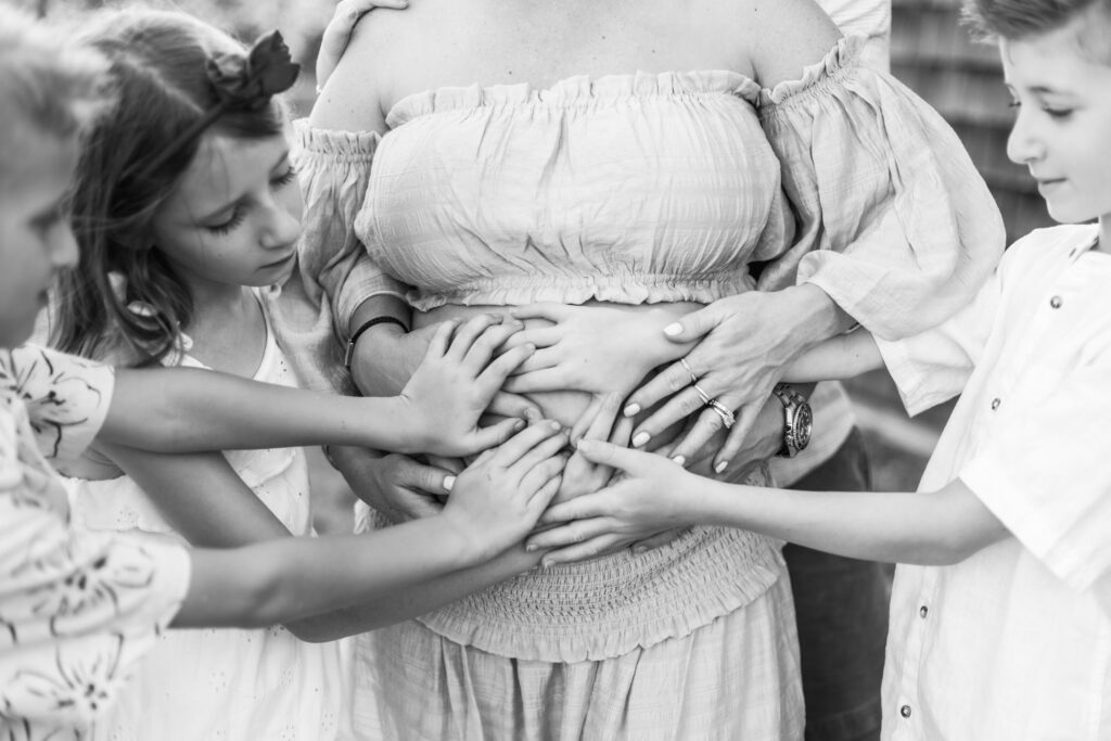 Family maternity portrait with parents and children in Palm Beach, Florida