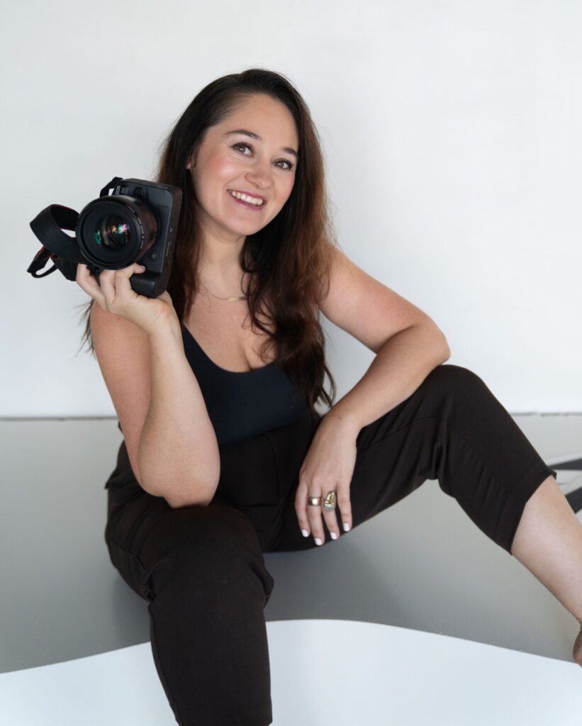 Palm Beach photographer Elina in the studio with her camera