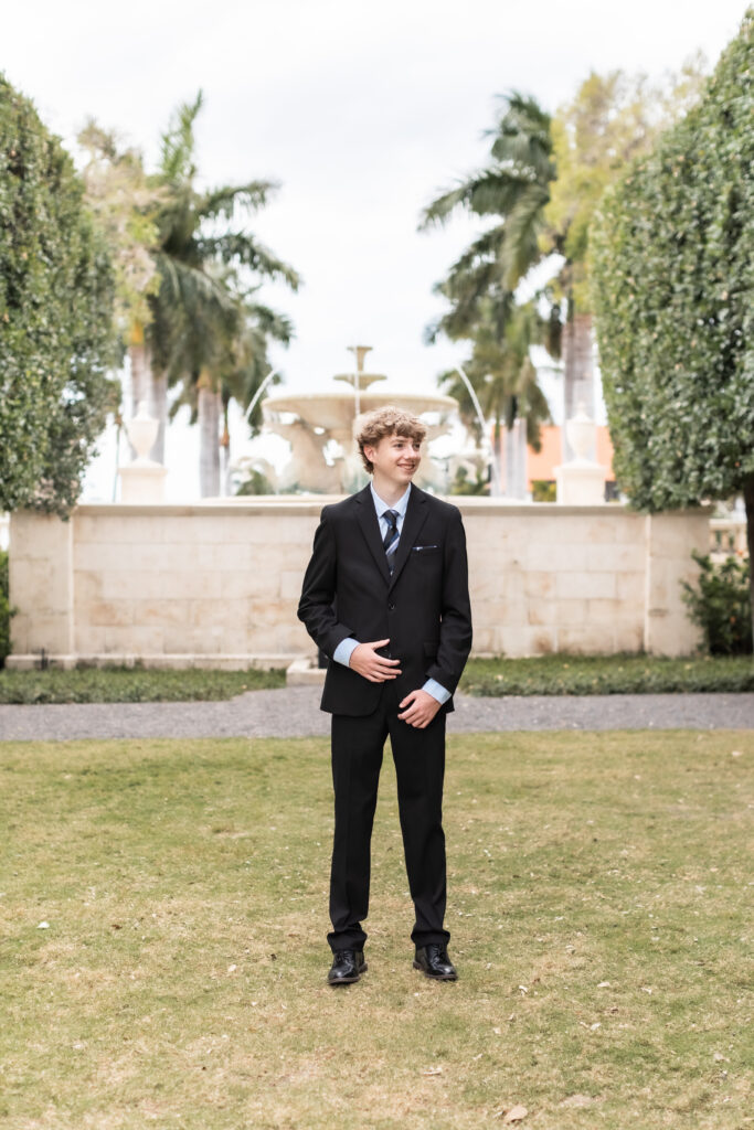 - High school senior walking on Worth Avenue in Palm Beach