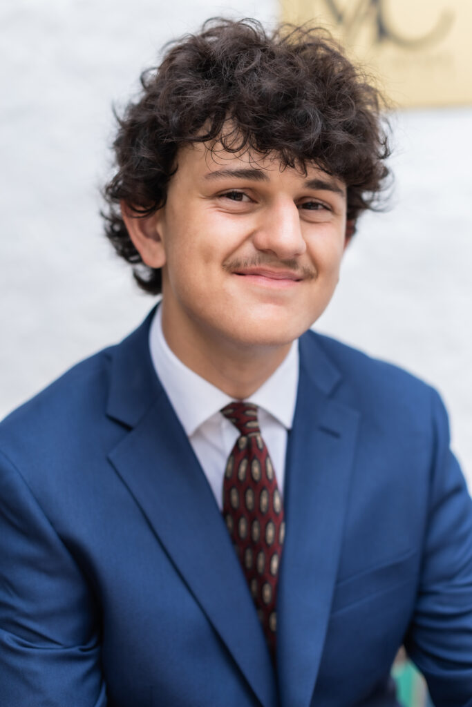 Worth Avenue senior photographer photographing her son for his senior portraits